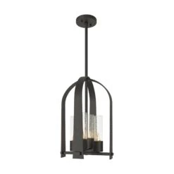 Triomphe Designer Outdoor Lantern - Arched Transitional Caged Light 33 Triomphe Designer Outdoor Lantern - Arched Transitional Caged Light -VERMONT WOODS Triomphe Outdoor Lantern Natural Iron Seeded Clear